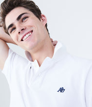 Cargar imagen en el visor de la galería, Polo Aero color blanco talla XS sin logo bordado