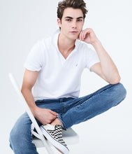 Cargar imagen en el visor de la galería, Polo Aero color blanco talla XS sin logo bordado