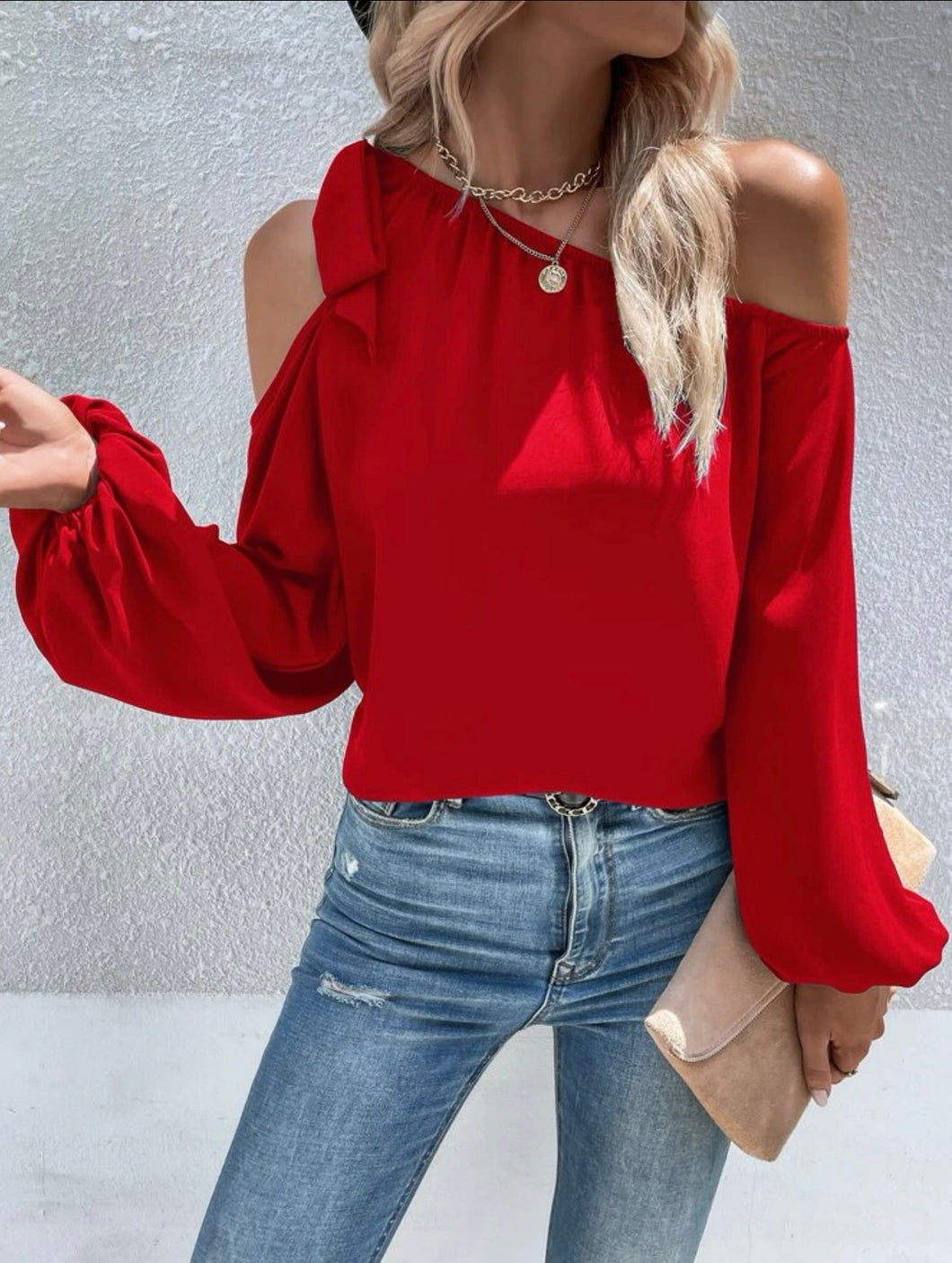 Blusa con lazo hotsell en el hombro