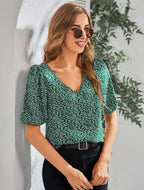 Blusa estampada con mangas abullonaras