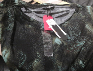 Blusa Kenneth Cole animal print talla S