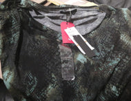 Blusa Kenneth Cole animal print talla S